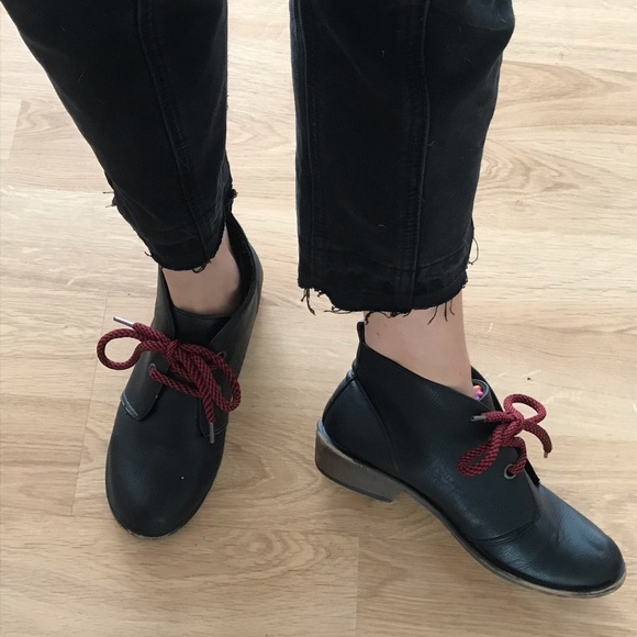 black booties with red laces